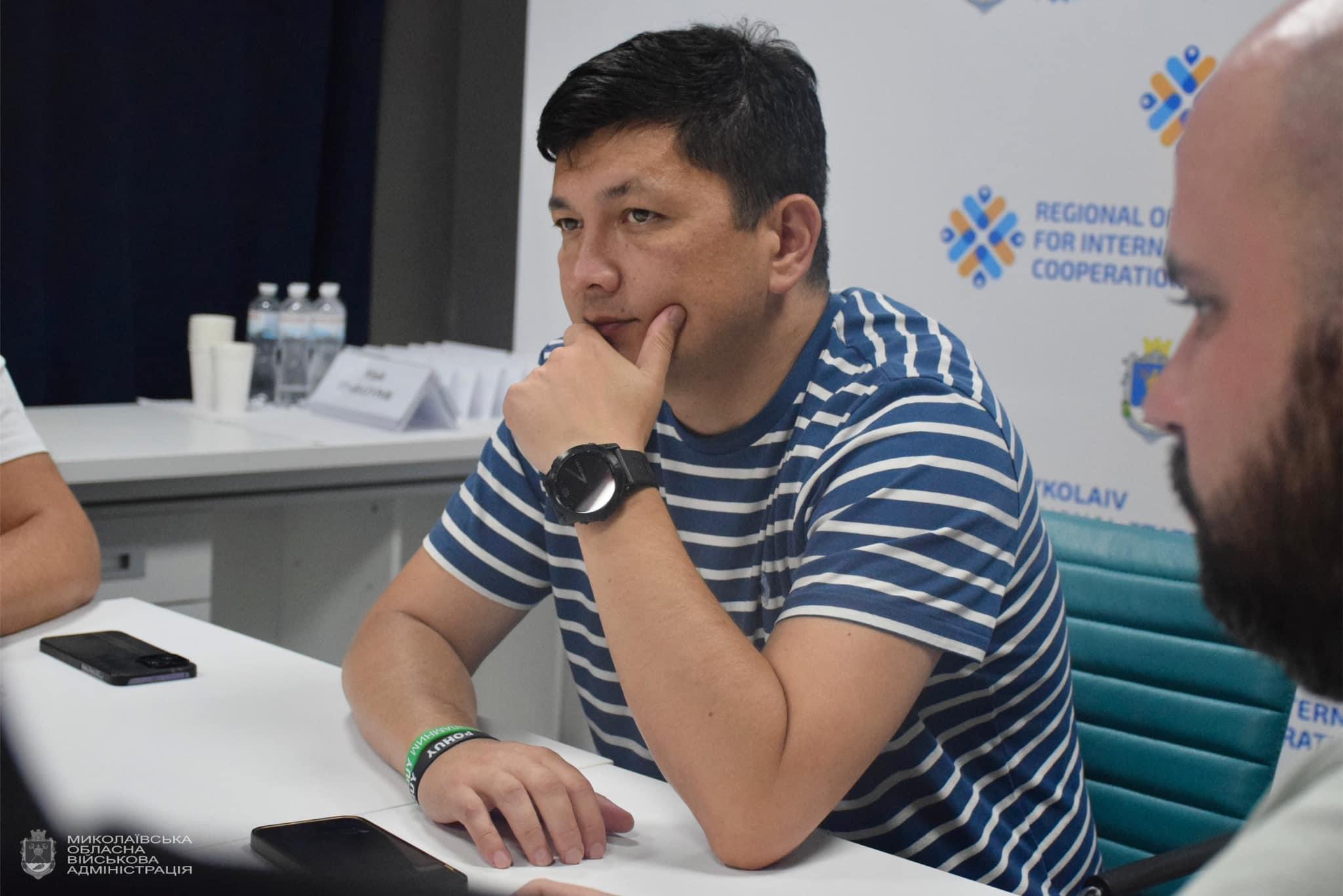 Community stakeholders in a program coordination meeting